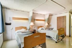 A patients shared room at Ivy Park Post Acute